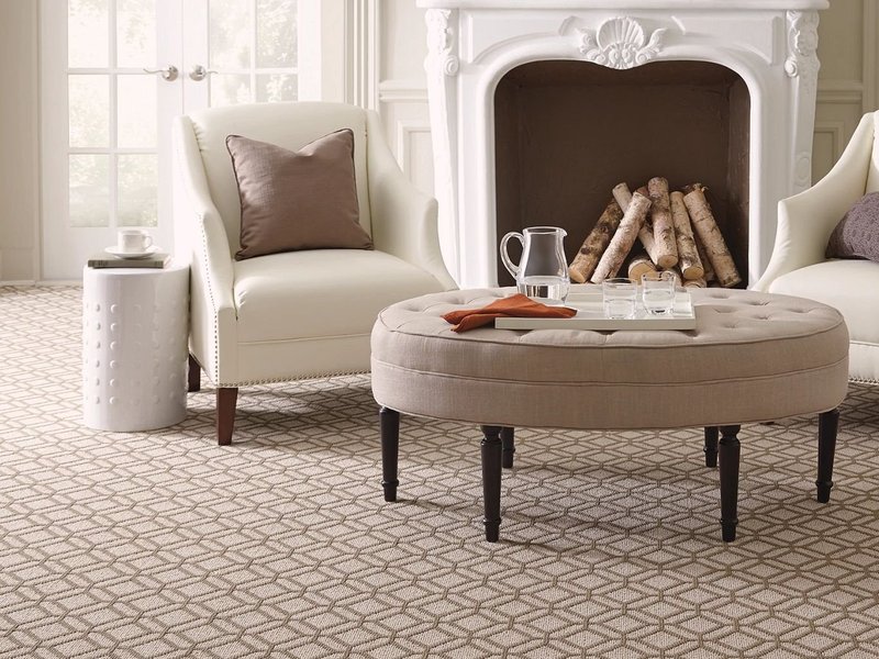 two white chairs and a round table in front of a chimney - bdflooringinc